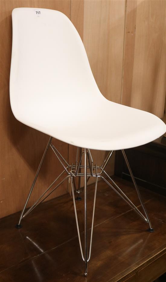 A modern chrome base chair